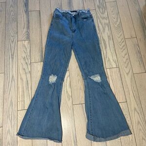 Distressed at the waist flare jeans
